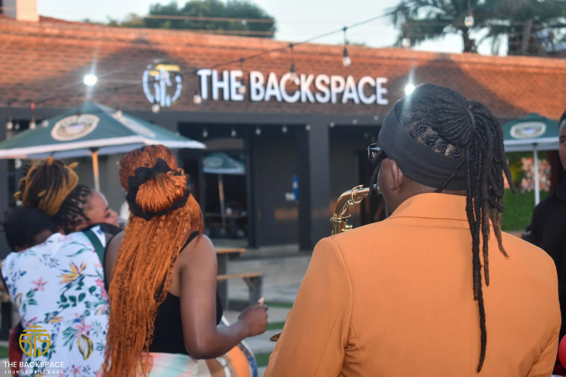 Live saxophone performance at The Backspace